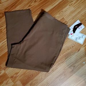 Woman with control pull on Slimming control top pants.